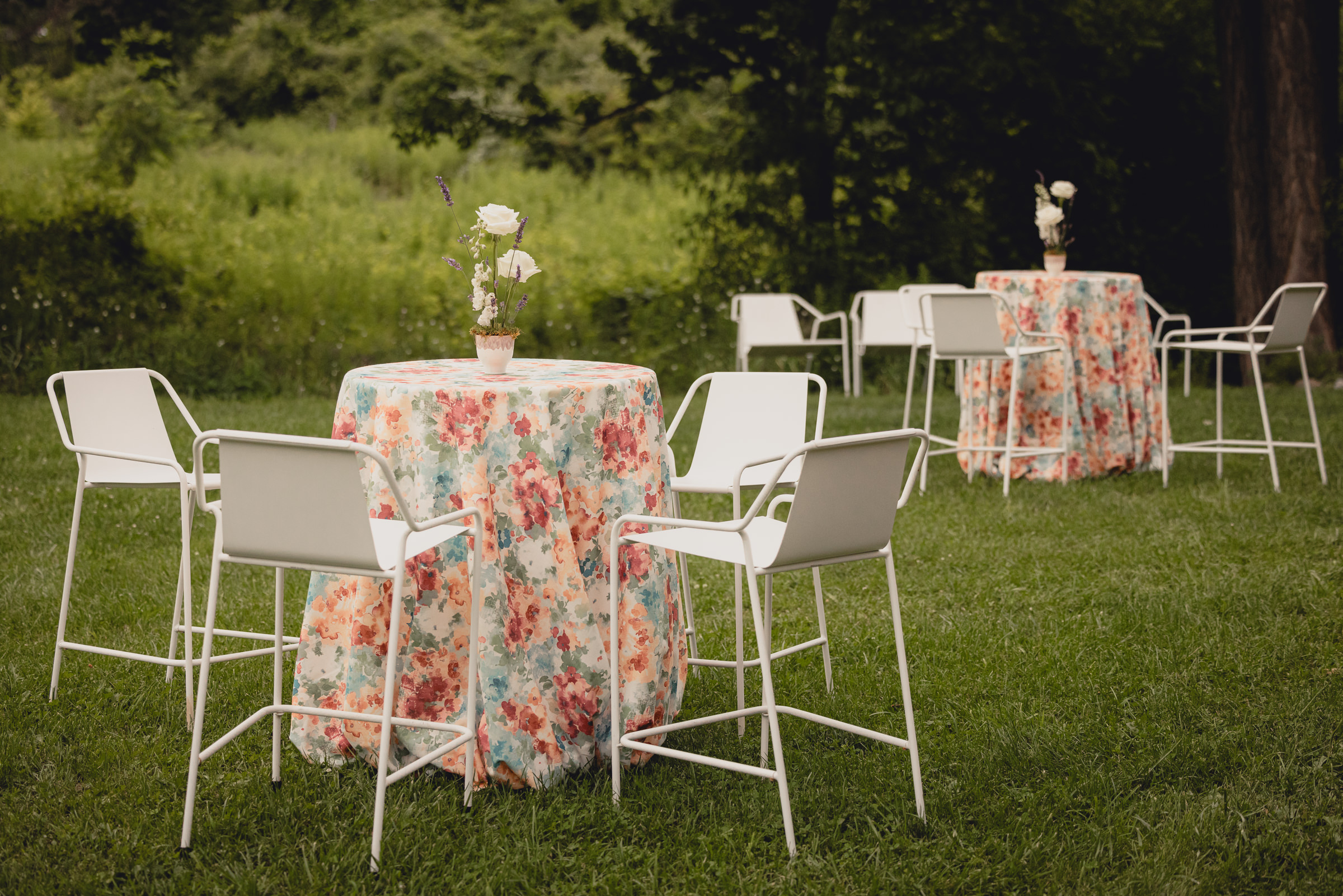 decor styled by Simply Beautiful Events and florals by Pistil and Pollen at wedding reception in barn at The North Farm in Geneva, NY