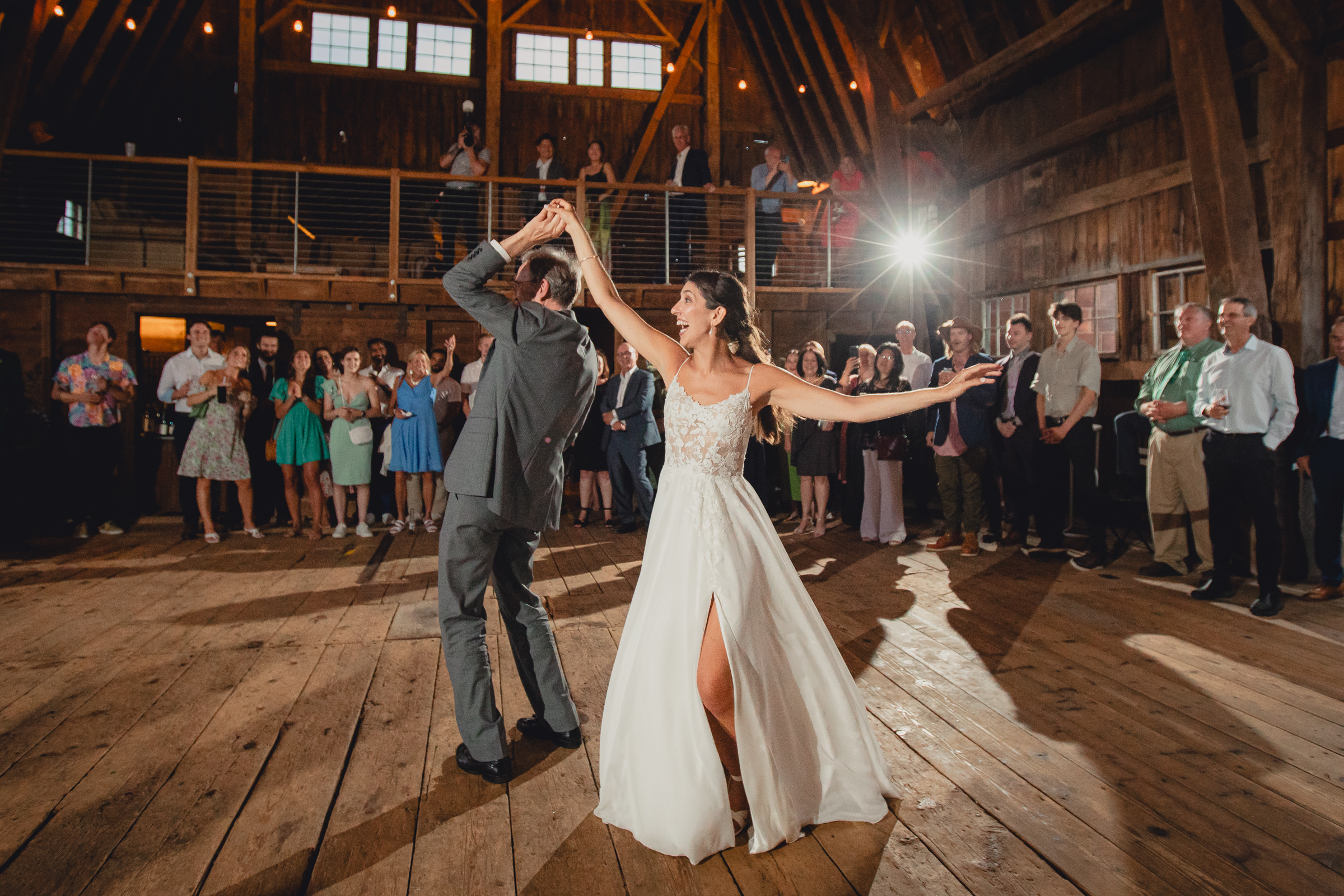 father and bride dance at wedding reception in barn at The North Farm in Geneva, NY