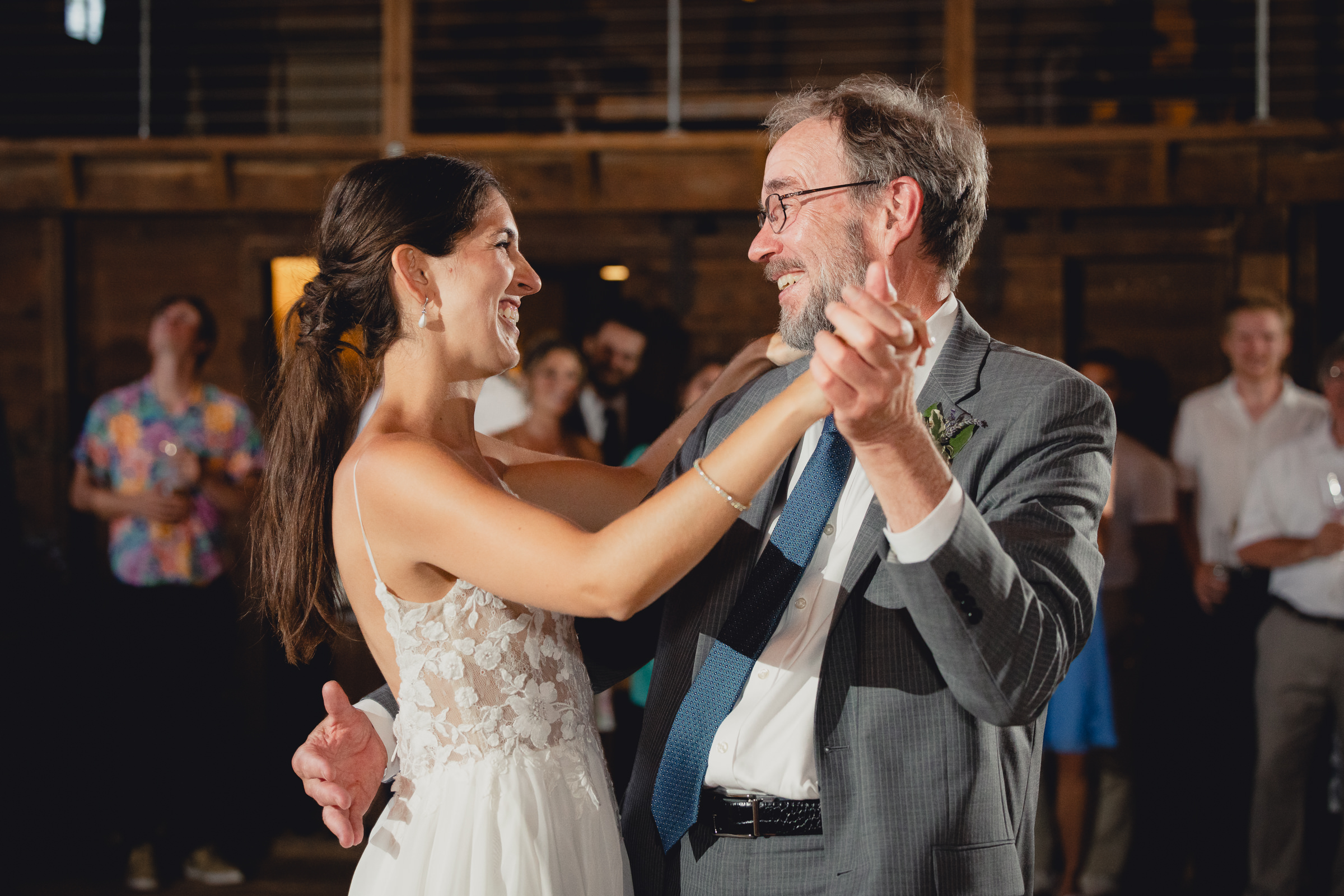 father and bride dance at wedding reception in barn at The North Farm in Geneva, NY
