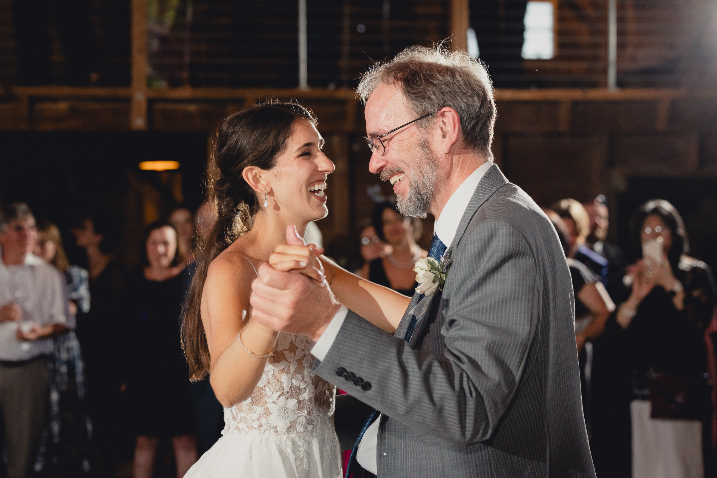 father and bride dance at wedding reception in barn at The North Farm in Geneva, NY
