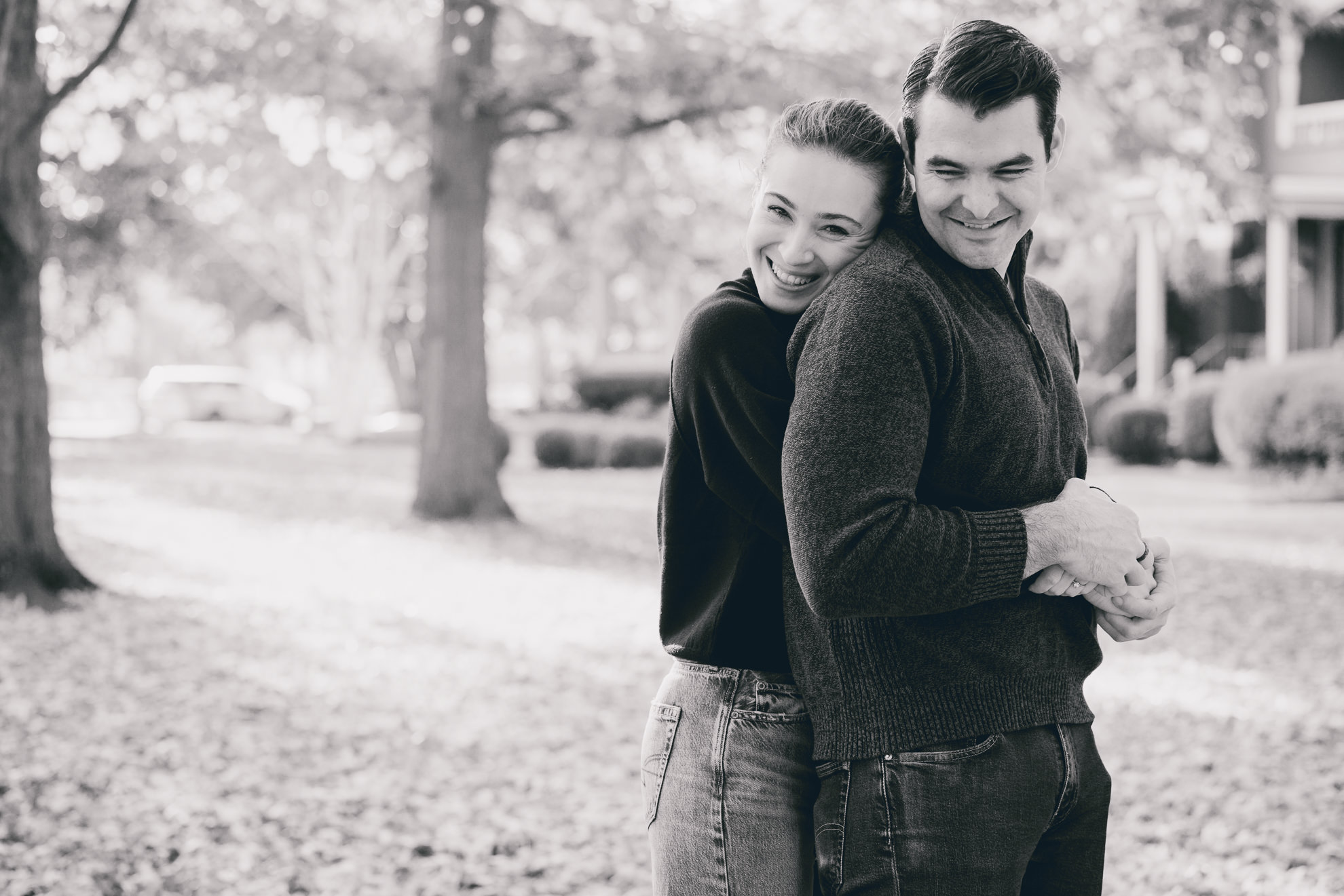 future bride and groom embrace in Allentown section of Buffalo, NY during their wedding engagement photos