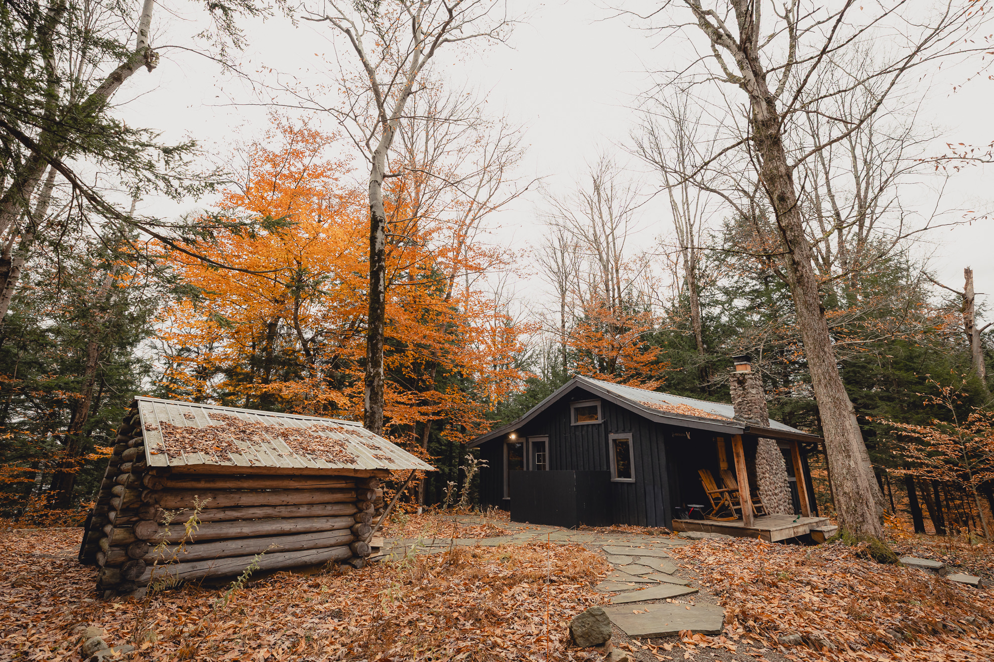 Langston Cottage at Vanderkamp NY among fall foliage before wedding elopement in the Adirondacks
