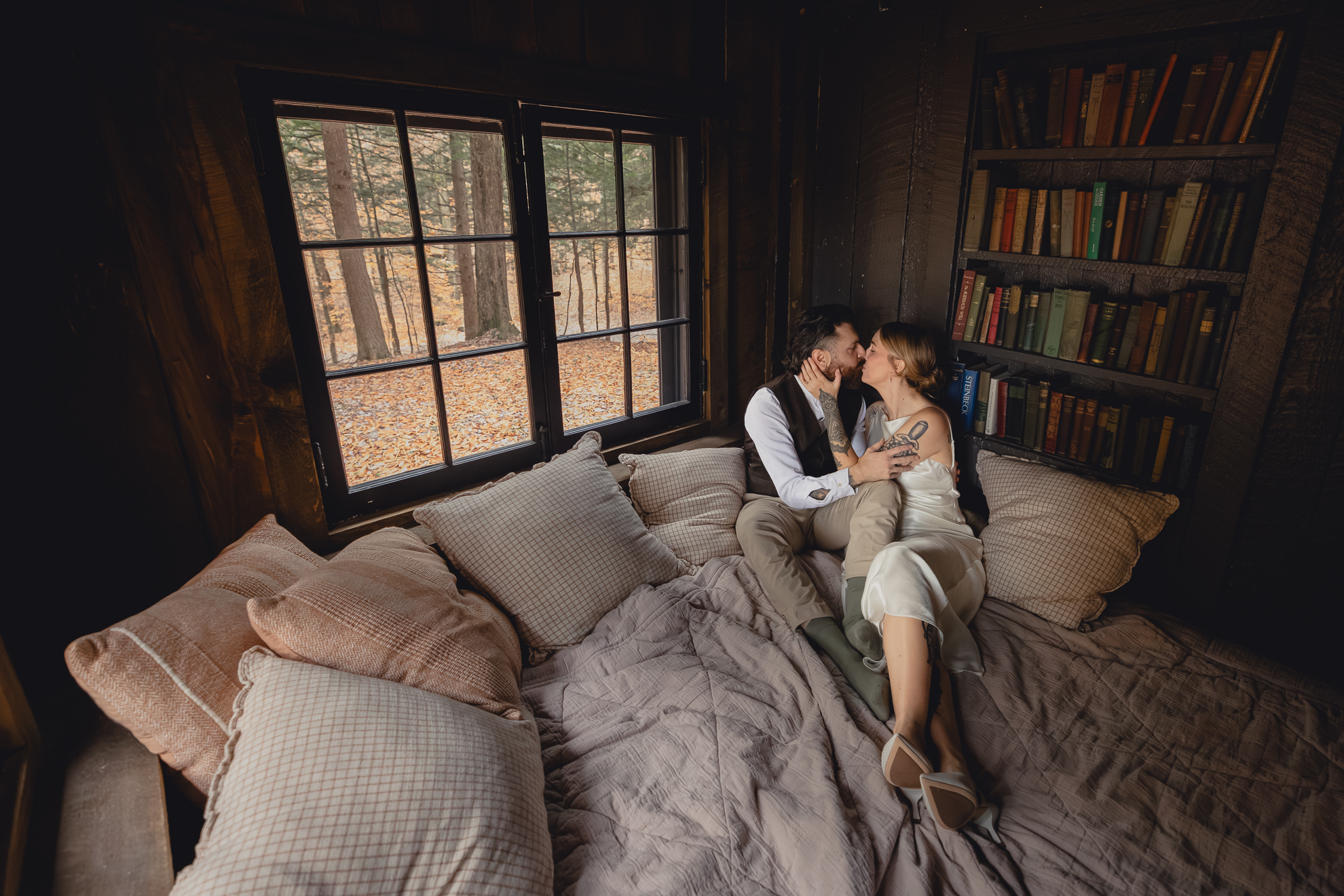 bride and groom kiss in Langston Cottage at Vanderkamp NY before fall wedding elopement